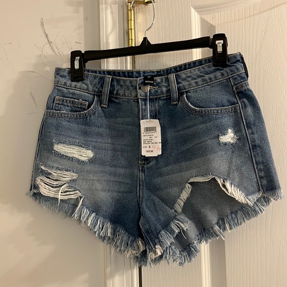 Windsor Pants - Windsor Jean shorts frayed cut out bottom. light to medium wash size small